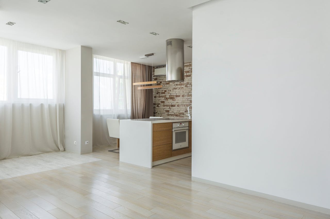 Spacious, bright kitchen with modern and minimalist design elements.